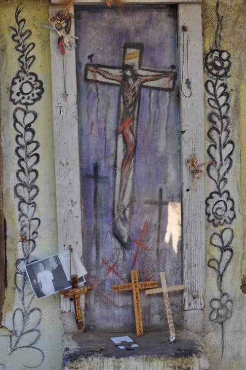 crucifix in chapel by DeGrazia