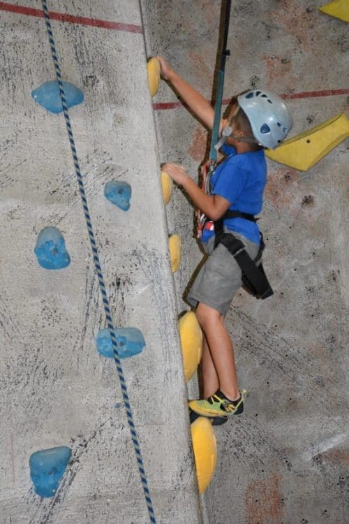 boy climbing at Rocks and Ropes