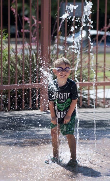 child playing Catalina Park Splash Pad | Guide to Catalina Park - Parking, Hours, Parties