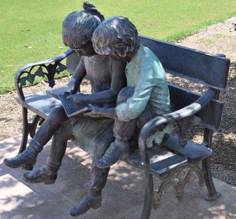 children reading sculpture Brandi Fenton Memorial Park | Park Profile: Brandi Fenton Memorial Park