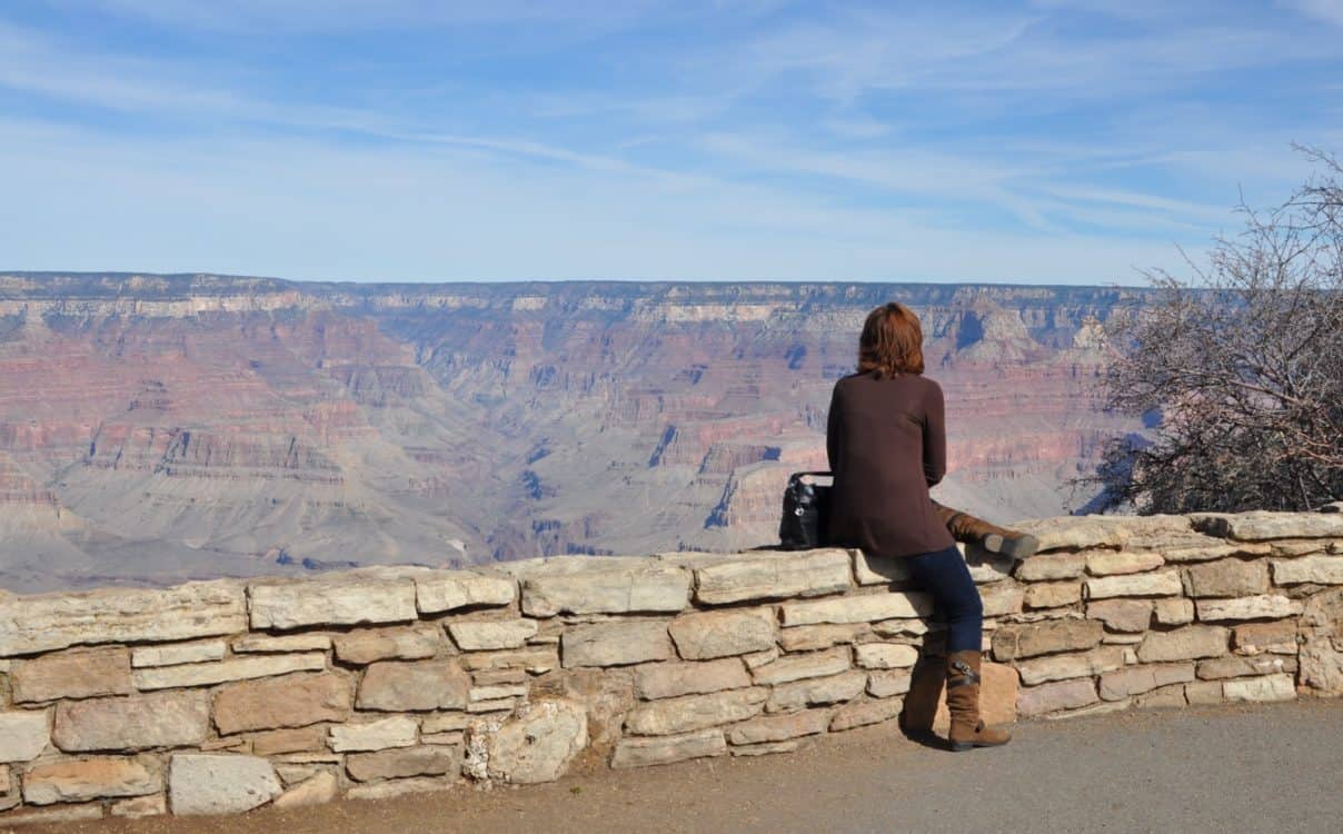 woman enjoying view Grand Canyon | ROAD TRIP: Grand Canyon Railway