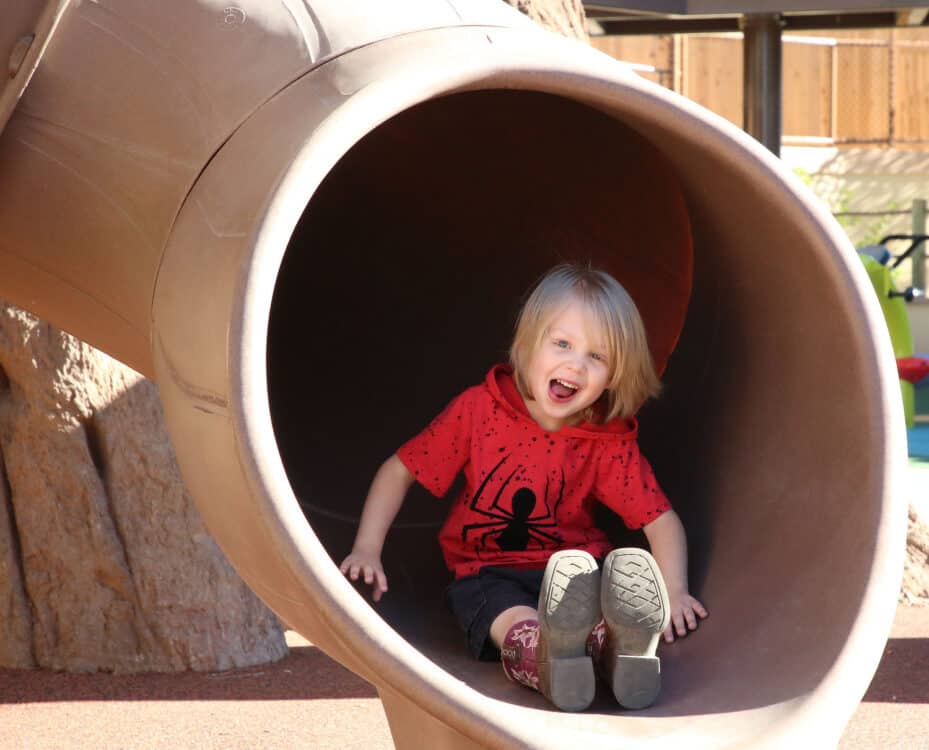 Young Child Slide World of Play Reid Park Zoo Tucson | Ultimate Guide to Reid Park Zoo